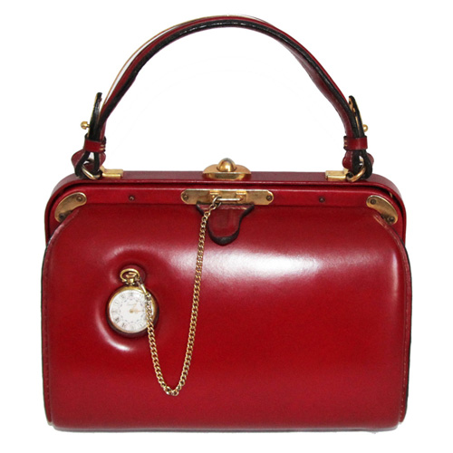 Wonderful Fernande Desgrange bag in box with a pocket watch.